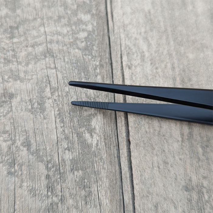 Tweezers with Rake